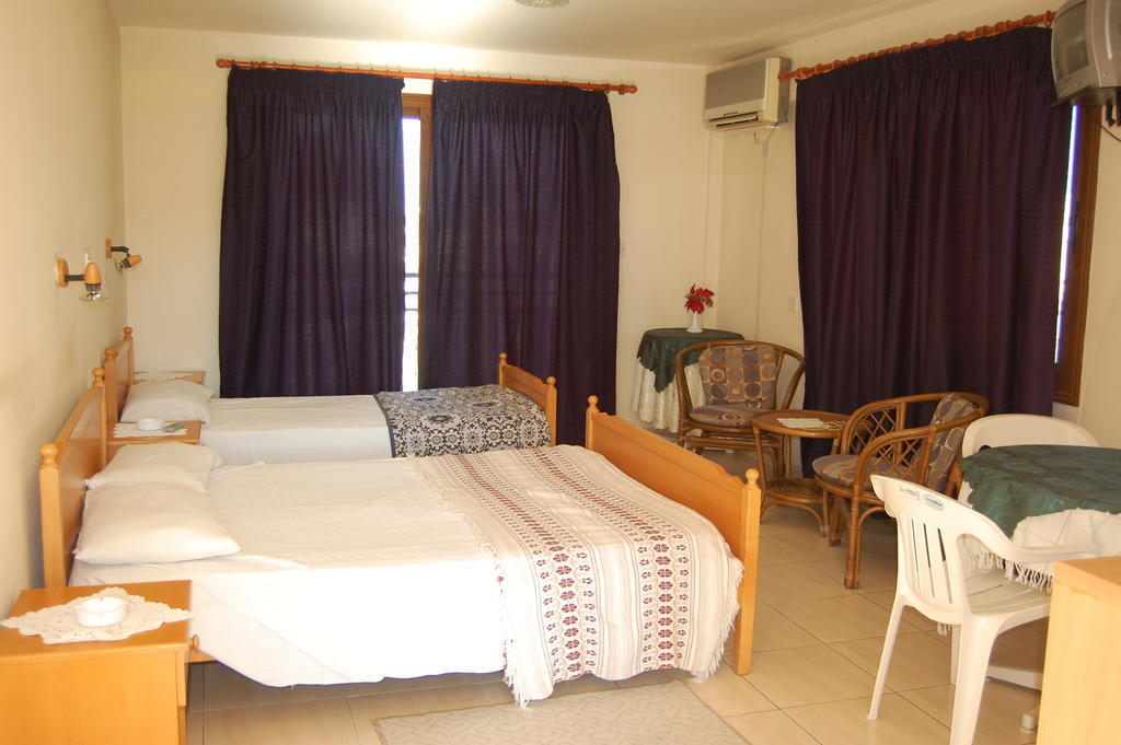Nicos & Olympia Apartments Polis Quarto foto
