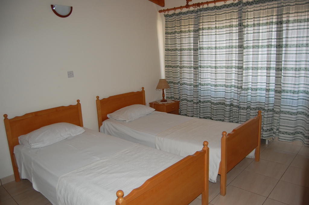 Nicos & Olympia Apartments Polis Quarto foto